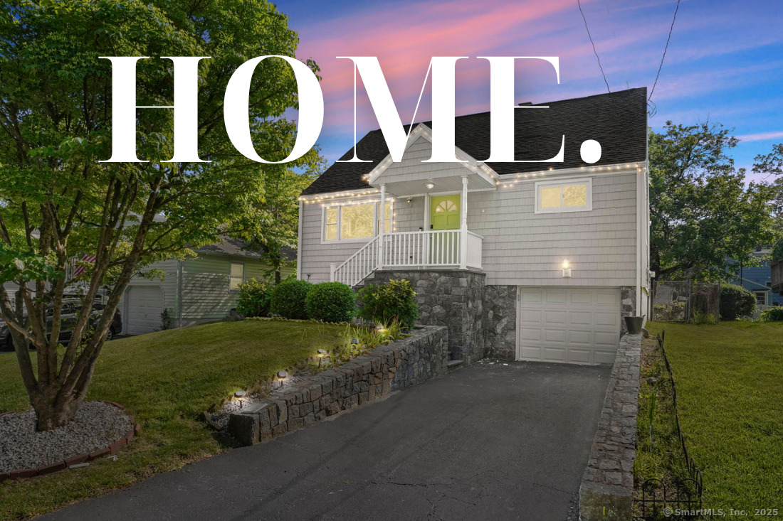 65 Bennett Street Fairfield, CT 06825 - Photo 1 of 1 a front view of a house with a yard