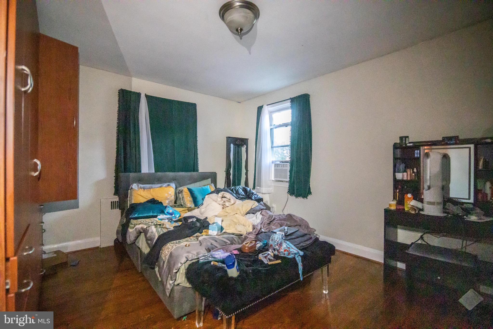 1649 Ralworth Road Baltimore, MD 21218 - Photo 11 of 47 a bed room with furniture and a window