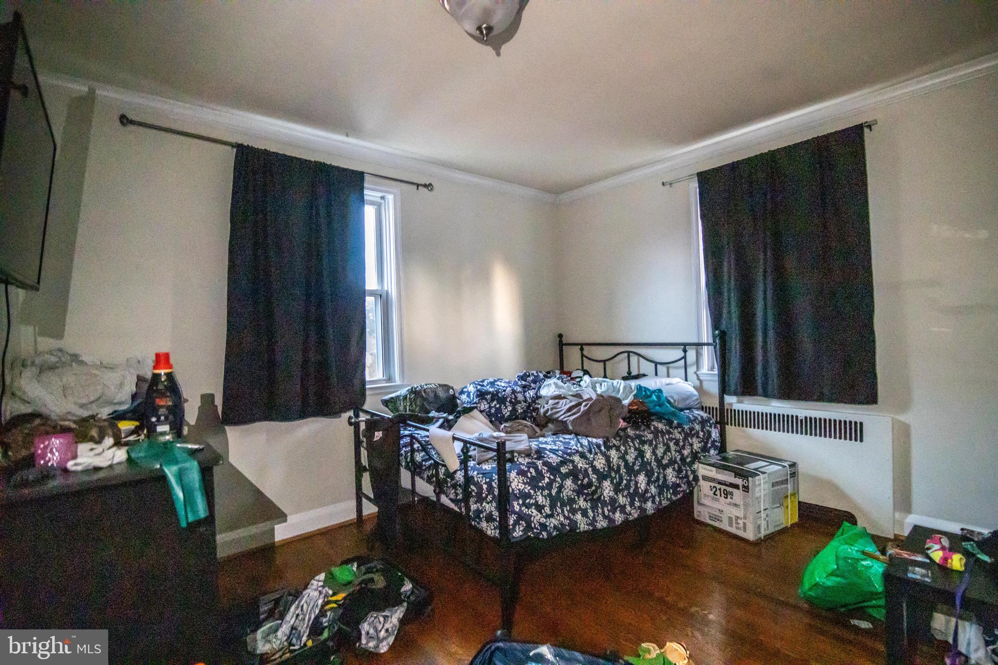 1649 Ralworth Road Baltimore, MD 21218 - Photo 17 of 47 a bed room with furniture and a window