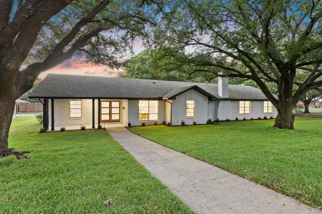 a house view with a garden space