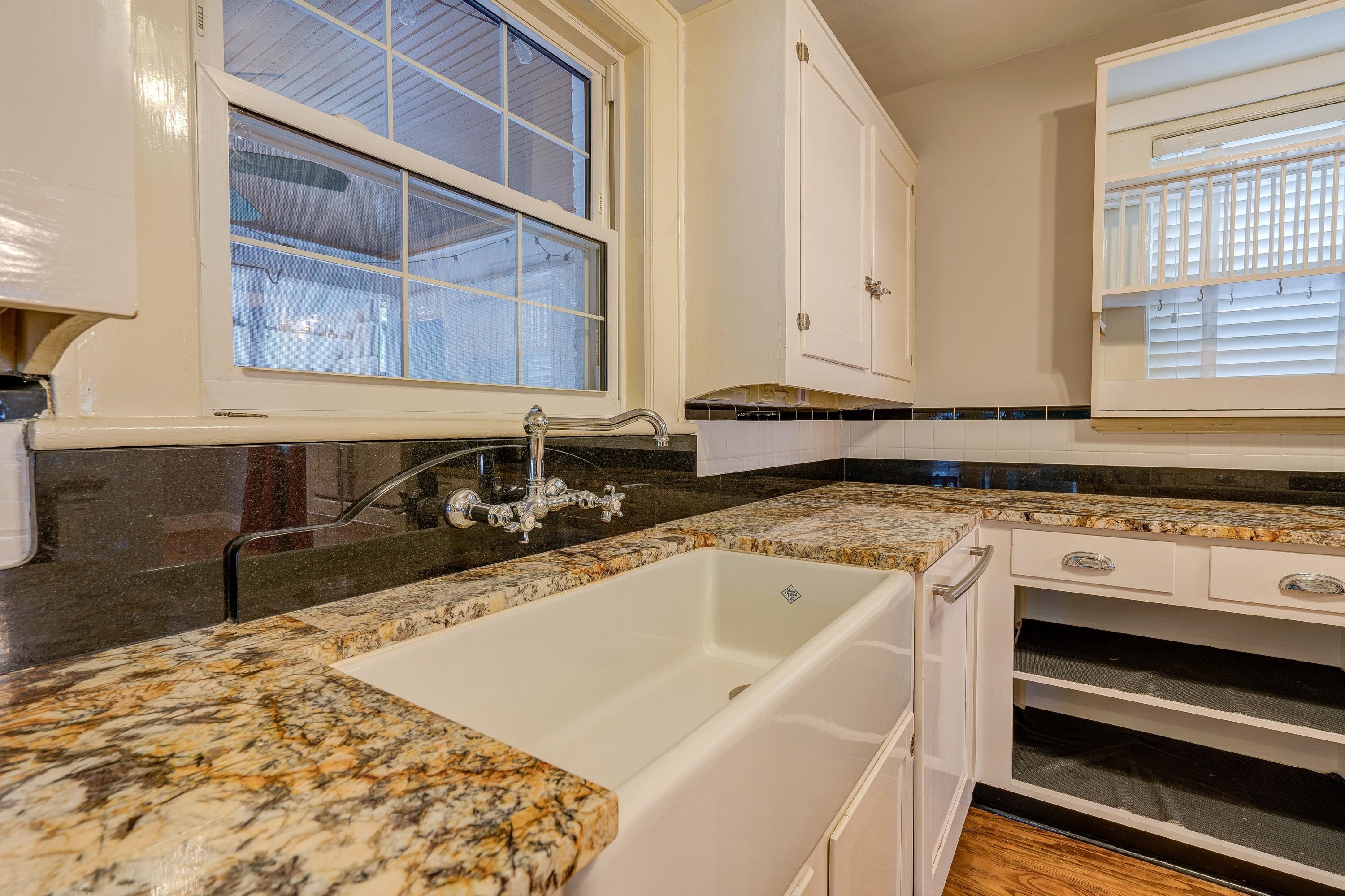 1502 Terrace Road Southwest Roanoke, VA 24015 - Photo 11 of 35 a view of a kitchen with a sink and cabinets