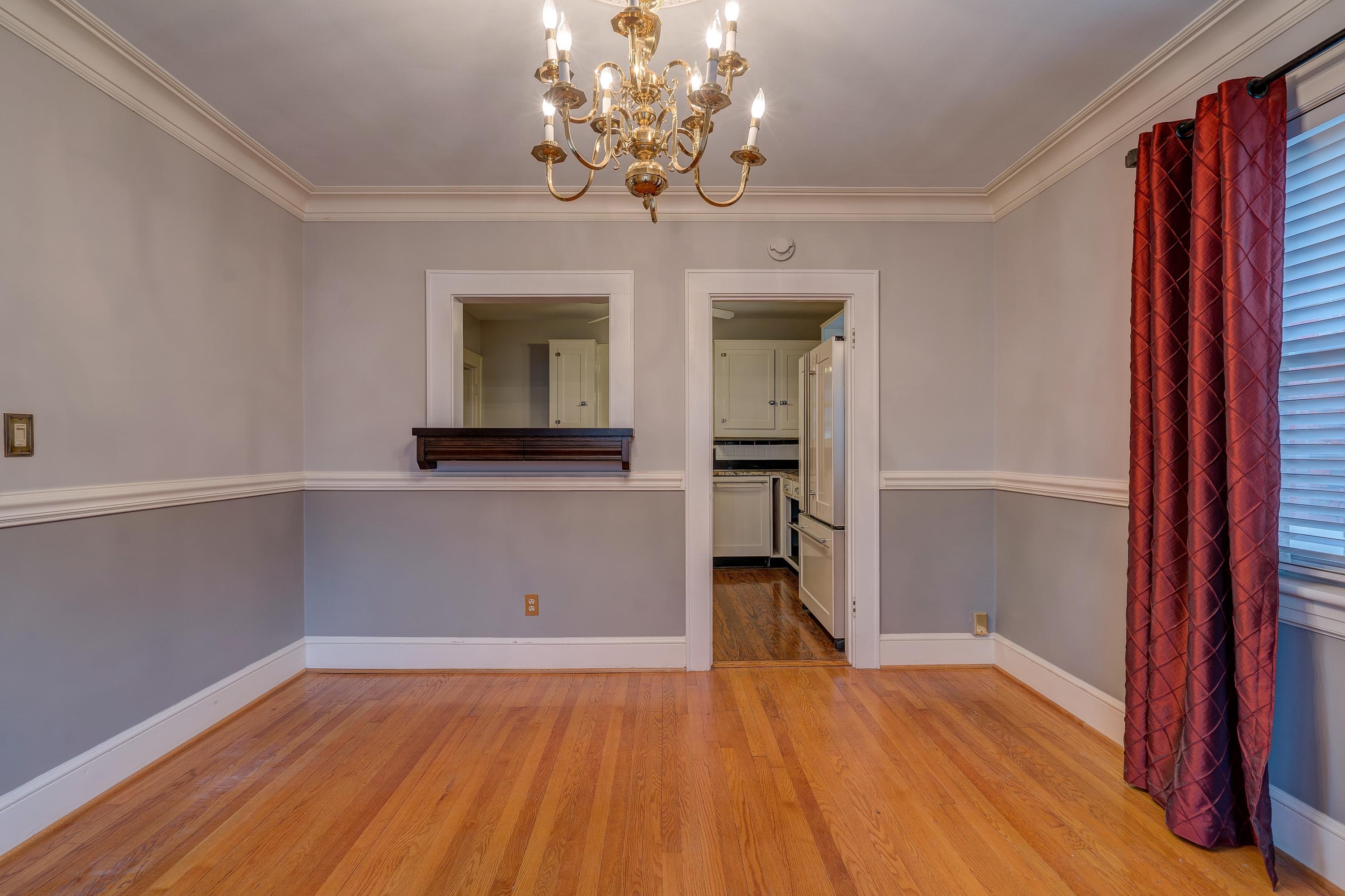 1502 Terrace Road Southwest Roanoke, VA 24015 - Photo 14 of 35 a view of a room with wooden floor and chandelier