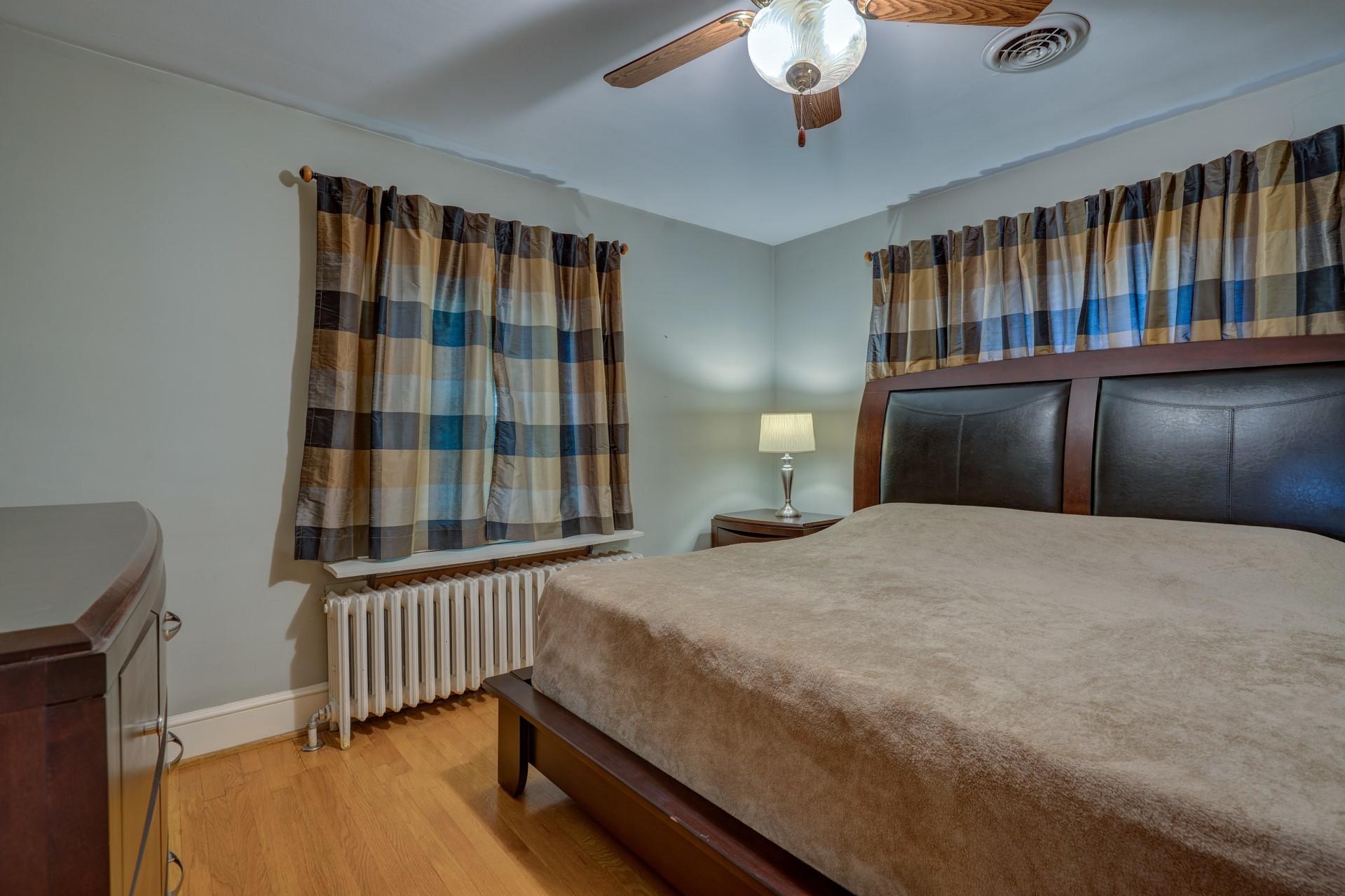 1502 Terrace Road Southwest Roanoke, VA 24015 - Photo 23 of 35 a bedroom with a bed and a window