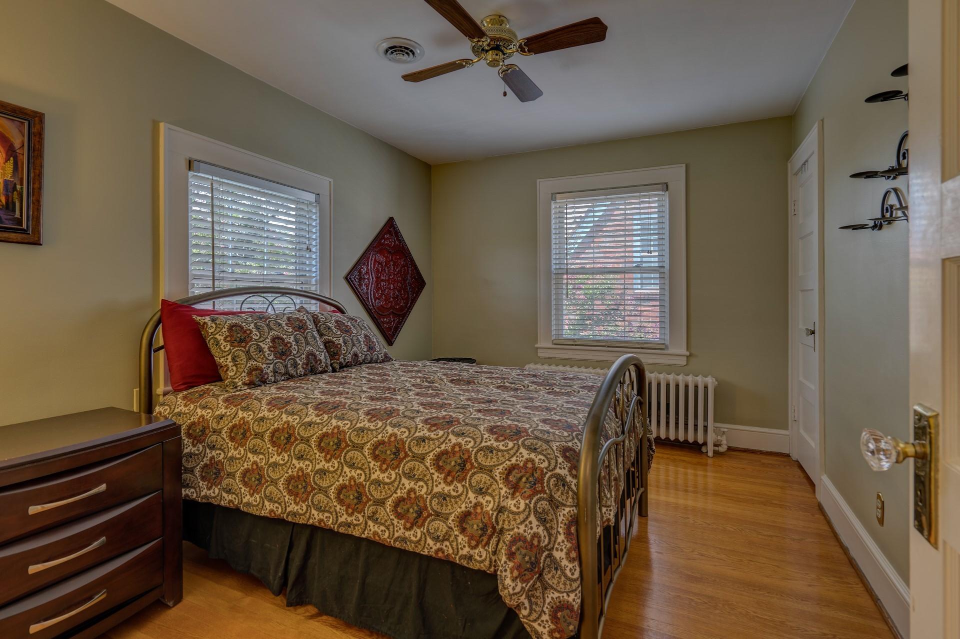 1502 Terrace Road Southwest Roanoke, VA 24015 - Photo 24 of 35 a bedroom with a bed and a window