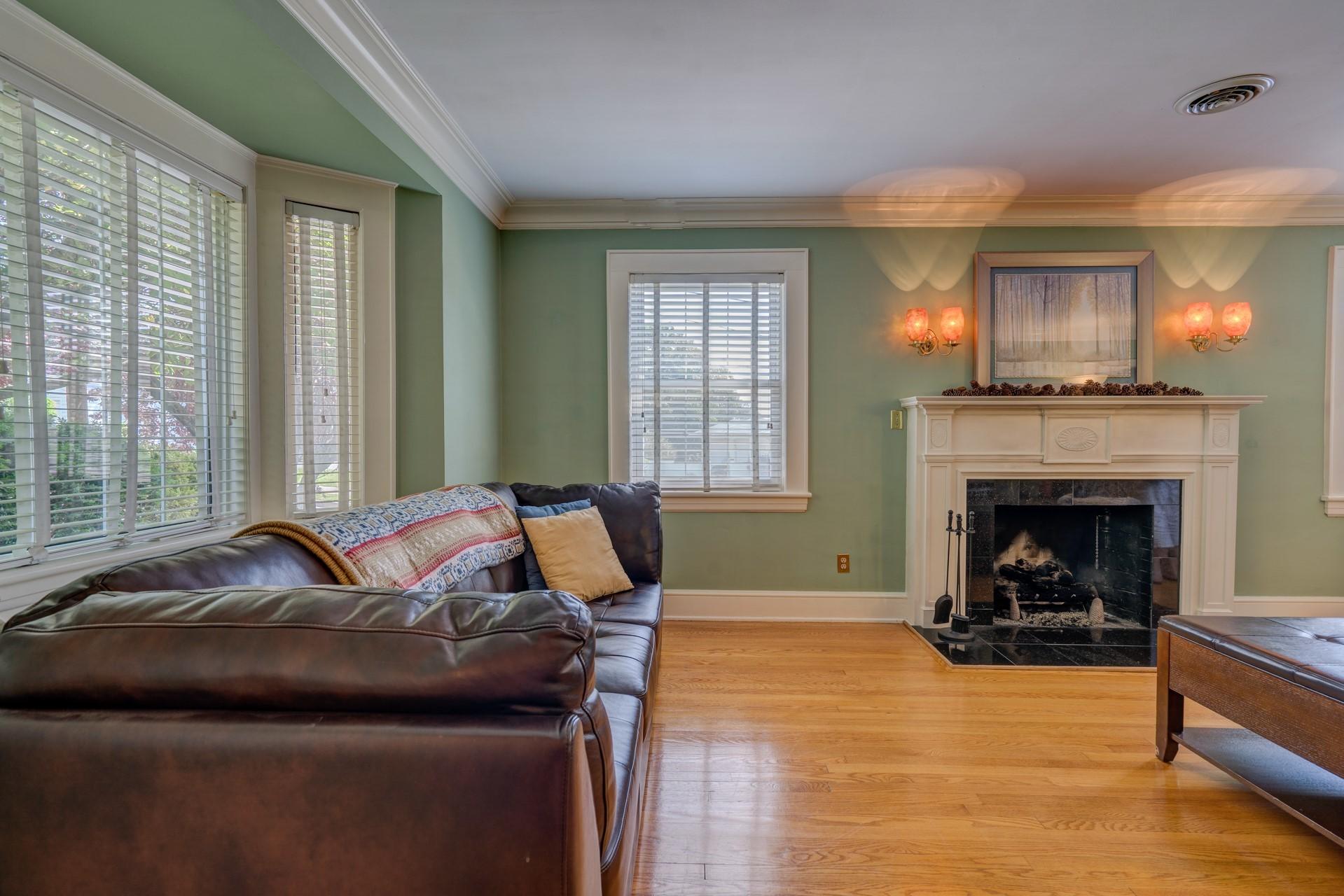 1502 Terrace Road Southwest Roanoke, VA 24015 - Photo 7 of 35 a living room with furniture and a fireplace