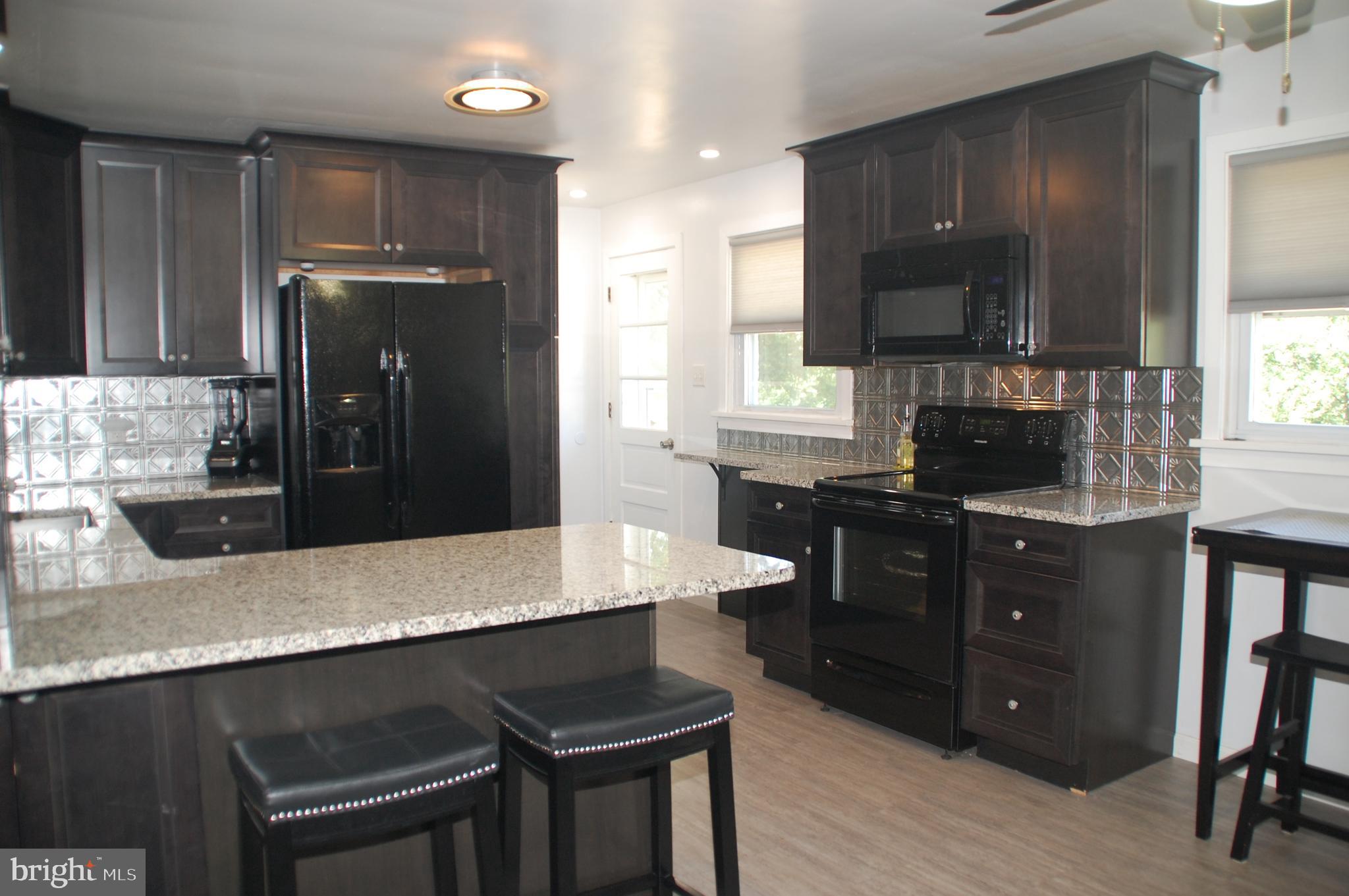 915 Callowhill Road Perkasie, PA 18944 - Photo 8 of 37 featuring ample cabinetry, granite countertops...