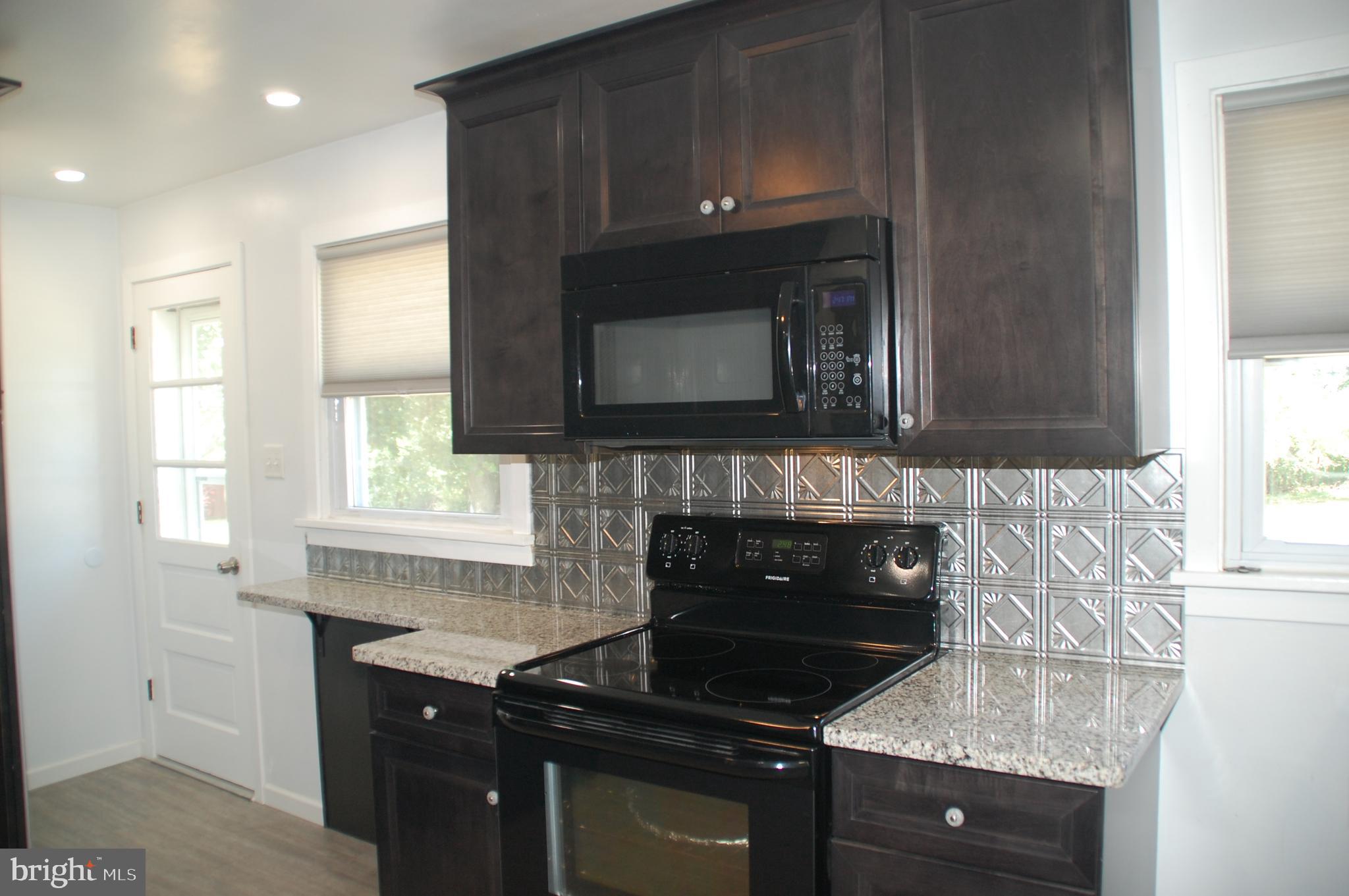 915 Callowhill Road Perkasie, PA 18944 - Photo 9 of 37 smooth-top range, and built-in microwave.