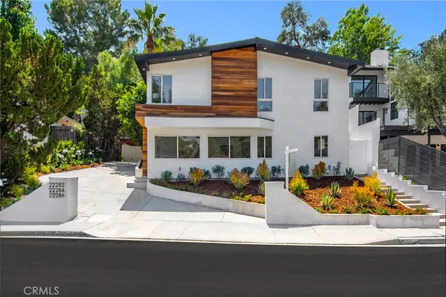 a view of a house with sitting area