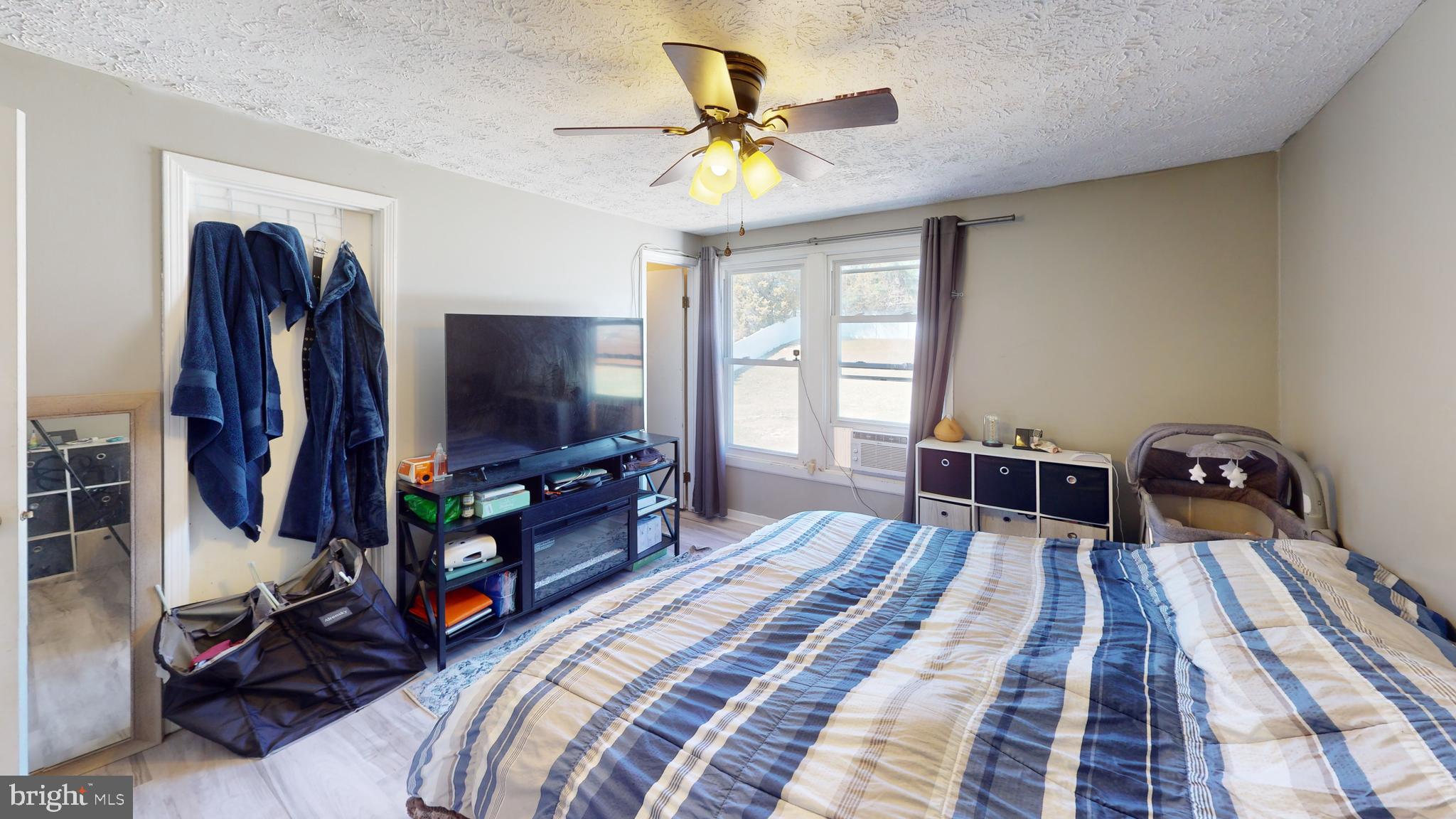 37 Decatur Lane Sicklerville, NJ 08081 - Photo 18 of 26 a bed room with a bed and a flat tv screen