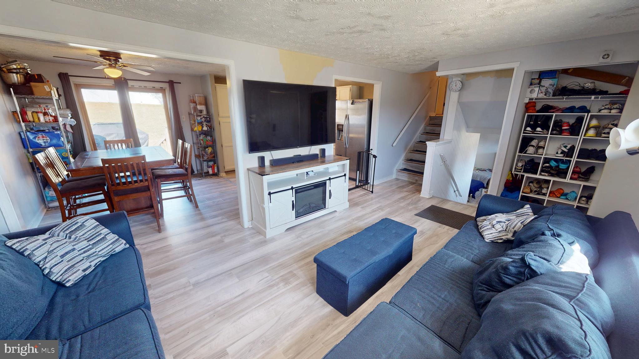 37 Decatur Lane Sicklerville, NJ 08081 - Photo 5 of 26 a living room with furniture and a flat screen tv