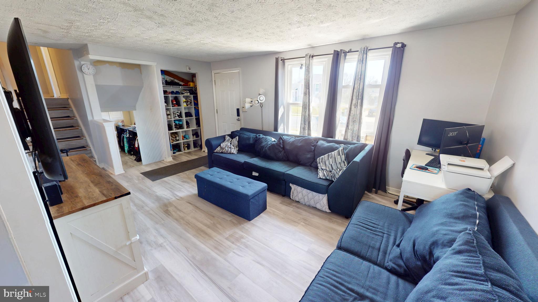37 Decatur Lane Sicklerville, NJ 08081 - Photo 6 of 26 a living room with furniture and a flat screen tv