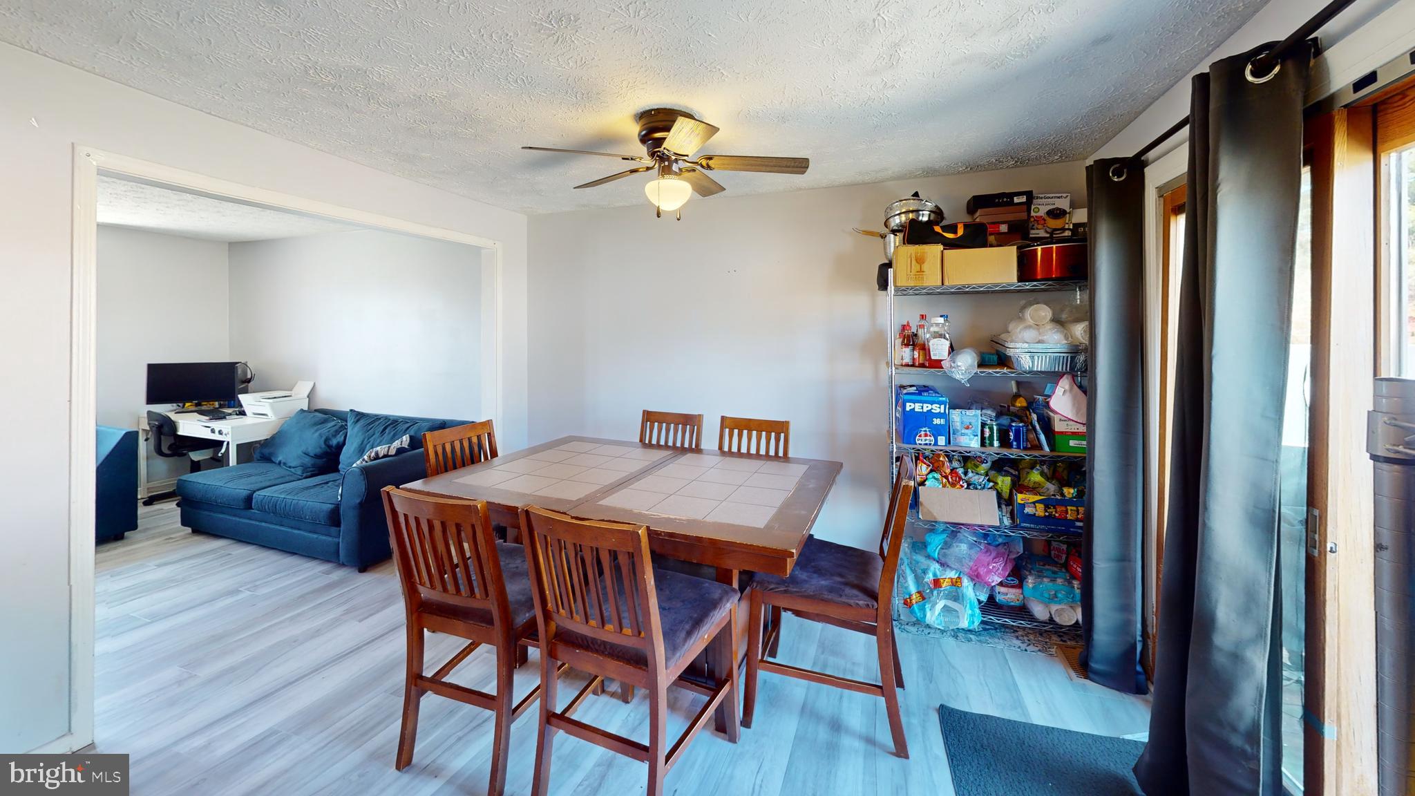 37 Decatur Lane Sicklerville, NJ 08081 - Photo 8 of 26 a view of a dining room with furniture and wooden floor