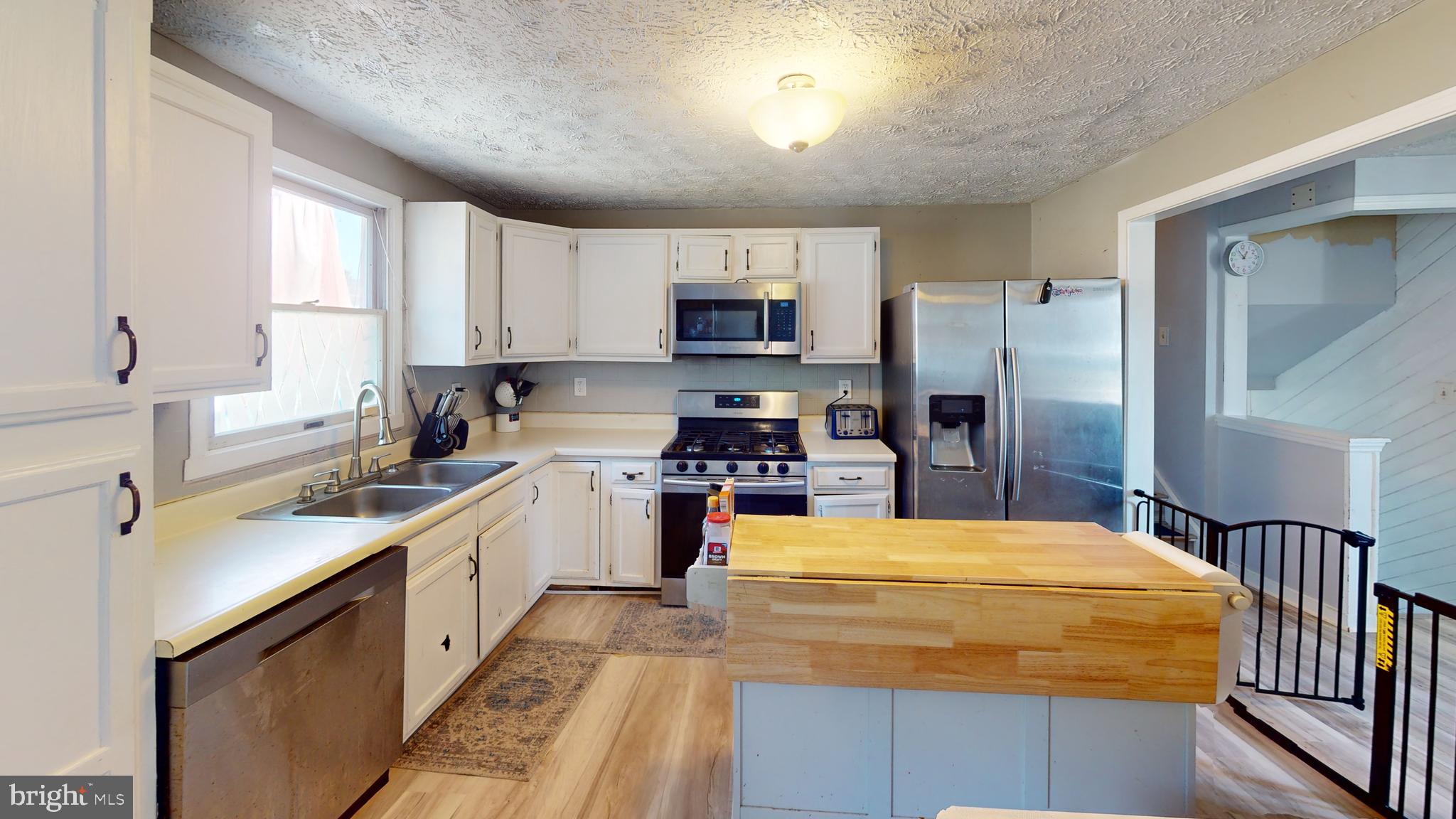 37 Decatur Lane Sicklerville, NJ 08081 - Photo 10 of 26 a kitchen with a sink stove top oven and refrigerator