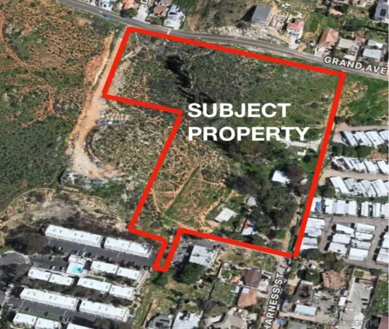 a street sign that is sitting in front of flowers