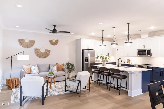 a view of a kitchen and dining room