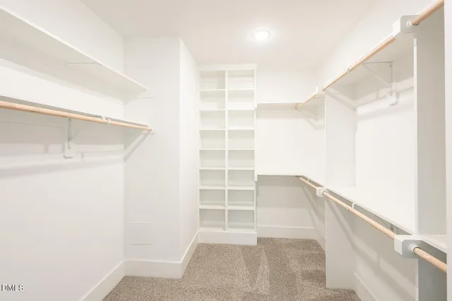 a view of an empty walk in closet