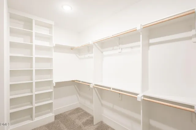 a bathroom with a sink a faucet and a mirror