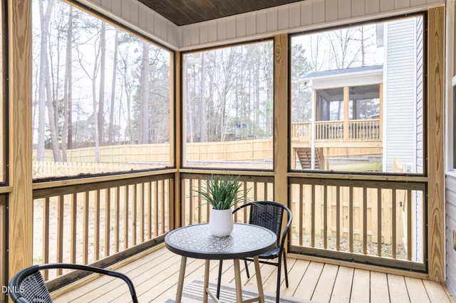 a view of a room with furniture window and wooden floor