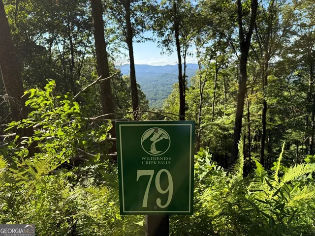 a sign that is sitting on a pole