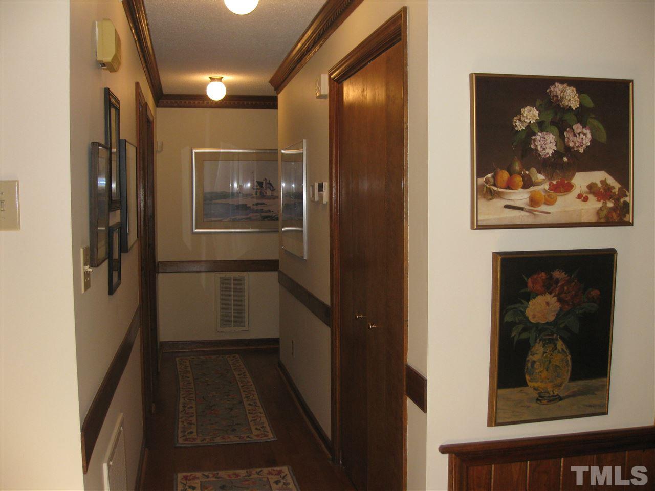 7904 Sutterton Court Raleigh, NC 27615 - Photo 10 of 22 Leading to master/ hardwood floors