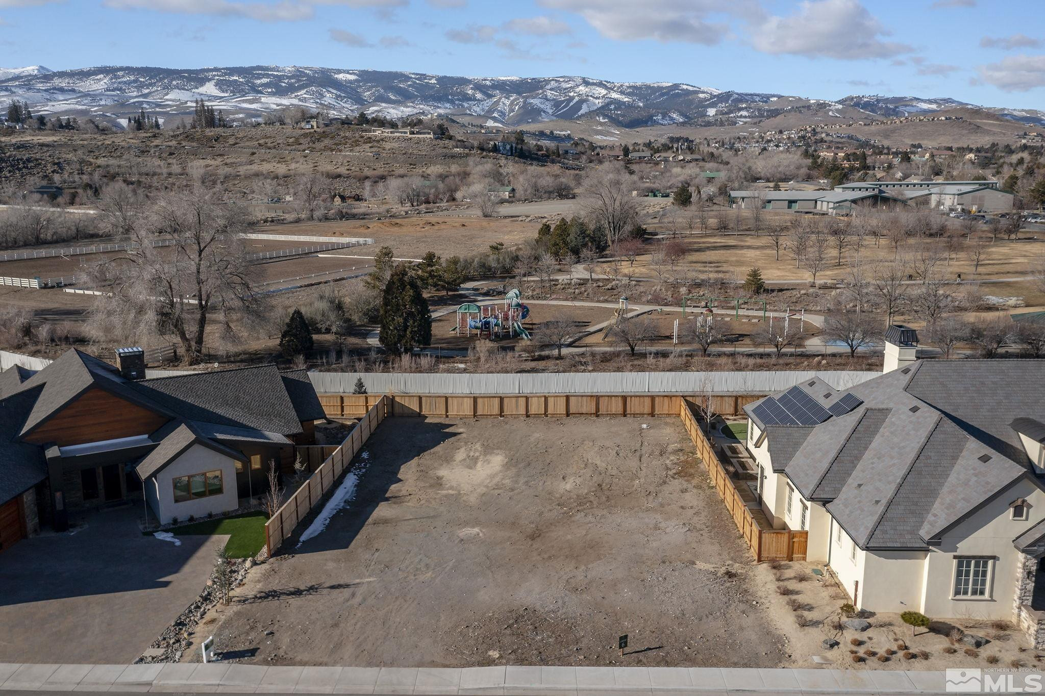 6161 Triple Crown, Unit 6 Reno, NV 89511 - Photo 3 of 6 an aerial view of a house with a mountain