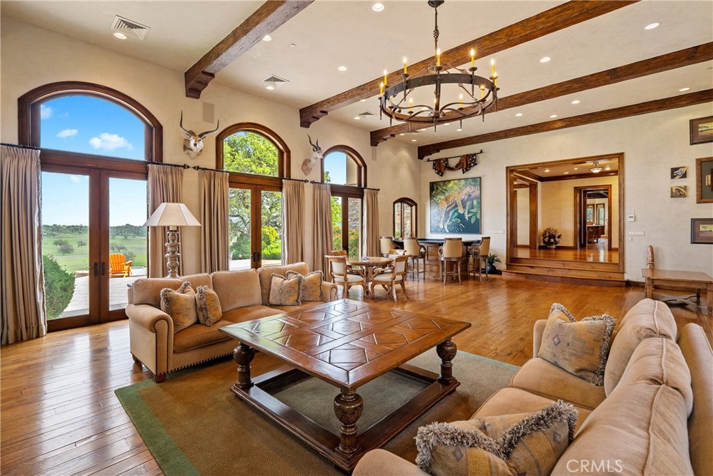 76525 Interlake Road Bradley, CA 93426 - Photo 12 of 75 a living room with furniture a large window and wooden floor