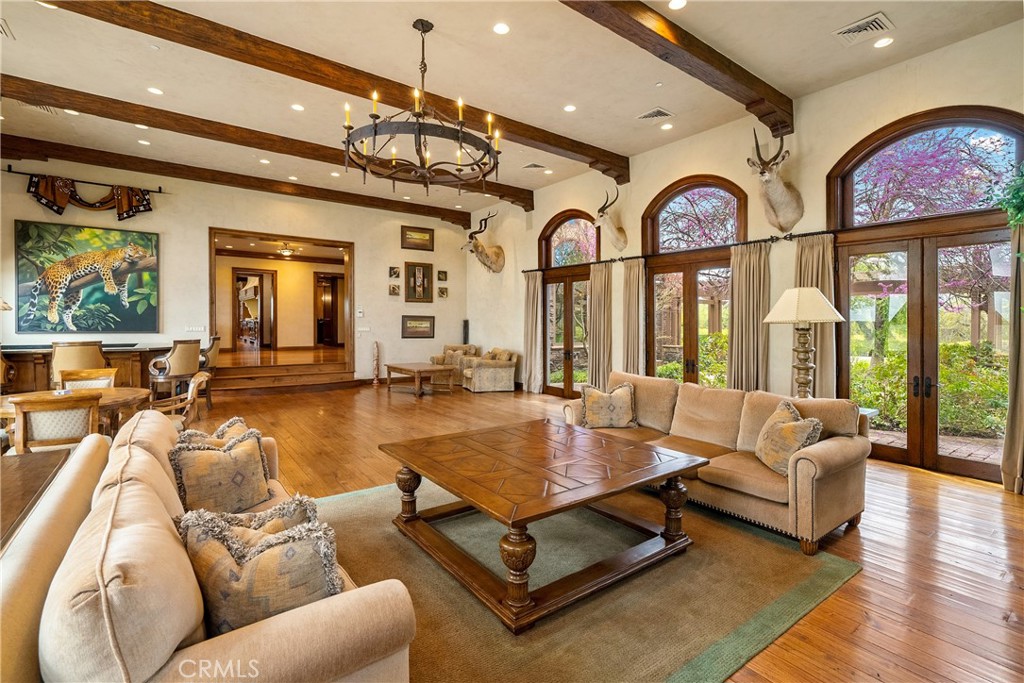 76525 Interlake Road Bradley, CA 93426 - Photo 13 of 75 a living room with furniture a large window and a clock