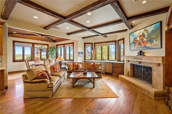 a white bath tub sitting in a bathroom next to a window