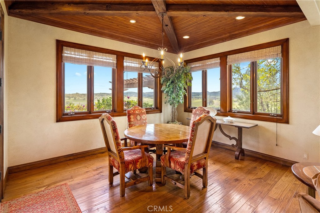 76525 Interlake Road Bradley, CA 93426 - Photo 22 of 75 a dining room with furniture a chandelier and wooden floor