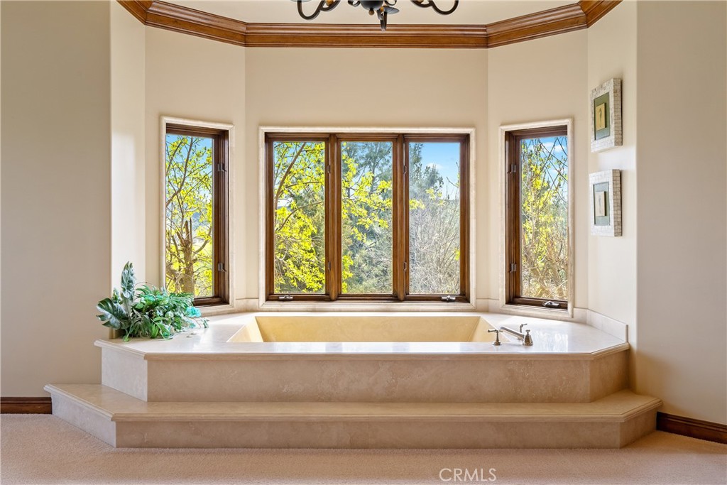 76525 Interlake Road Bradley, CA 93426 - Photo 27 of 75 a white bath tub sitting in a bathroom next to a window