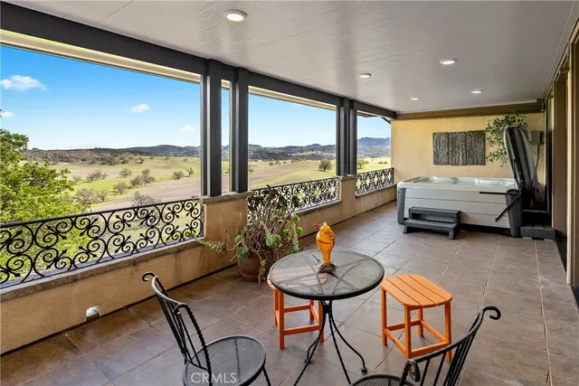 an outdoor space with view of lake