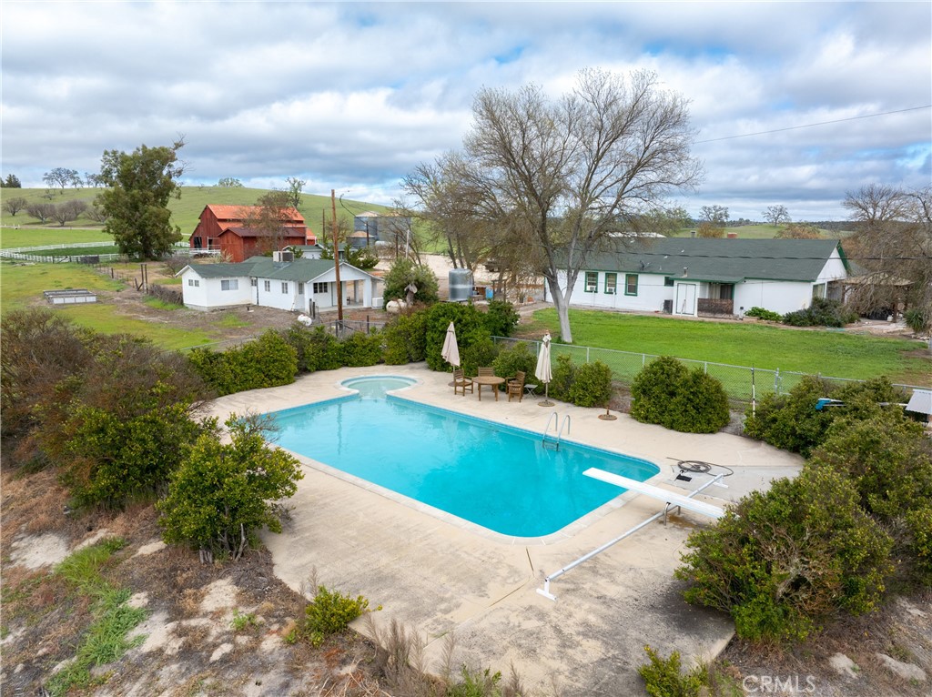 76525 Interlake Road Bradley, CA 93426 - Photo 58 of 75 a view of a swimming pool and trees in the background