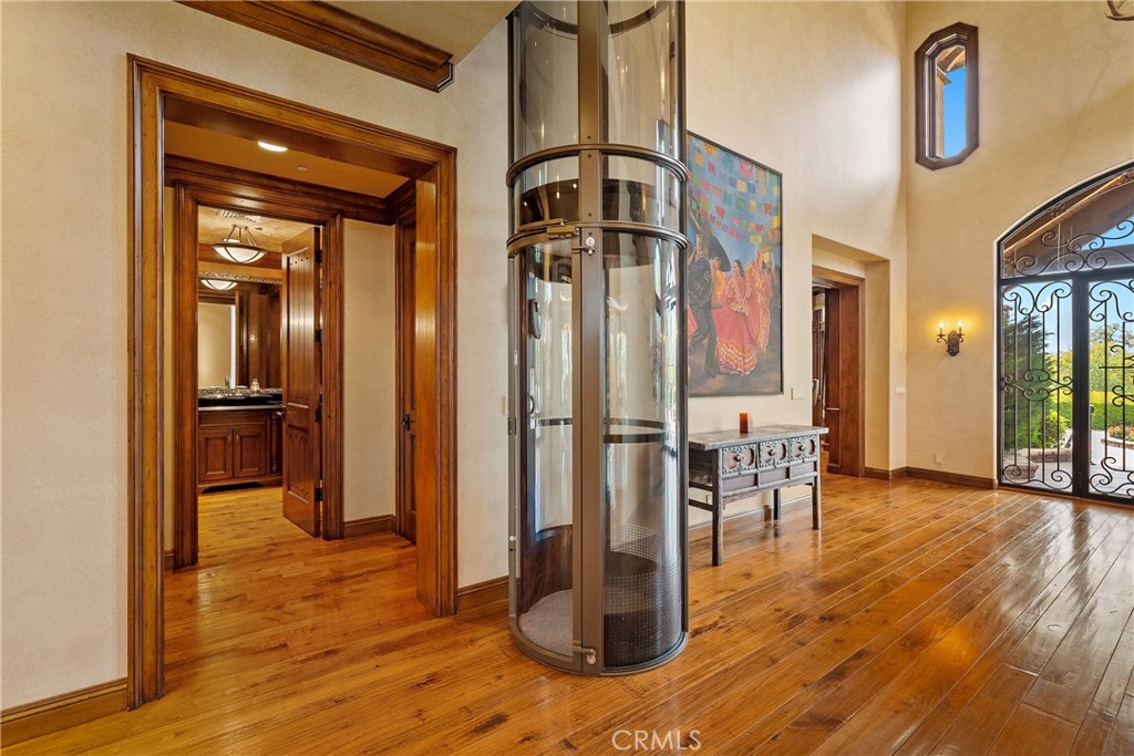 76525 Interlake Road Bradley, CA 93426 - Photo 8 of 75 a view of a hallway with wooden floor and furniture