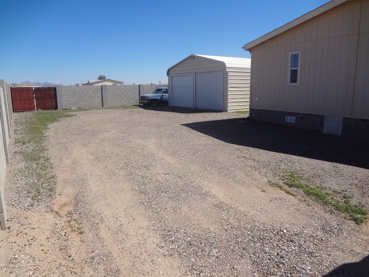 16341 Squatter Road Arizona City, AZ 85123 - Photo 5 of 18 driveway