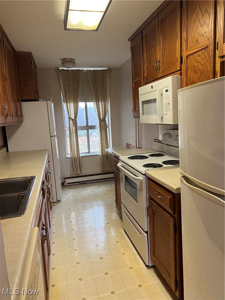3068 Kent Road, Unit 105C Stow, OH 44224 - Photo 10 of 42 Kitchen with 2 refrigerators and breakfast bar