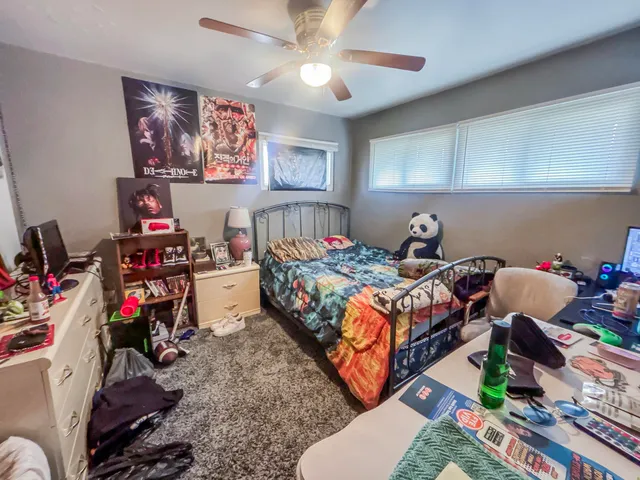 a view of a studio with wooden floor