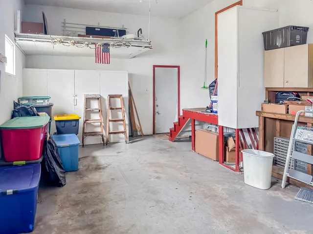 a backyard of a house with yard and seating area