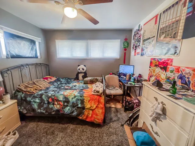 a view of a livingroom with furniture and toys