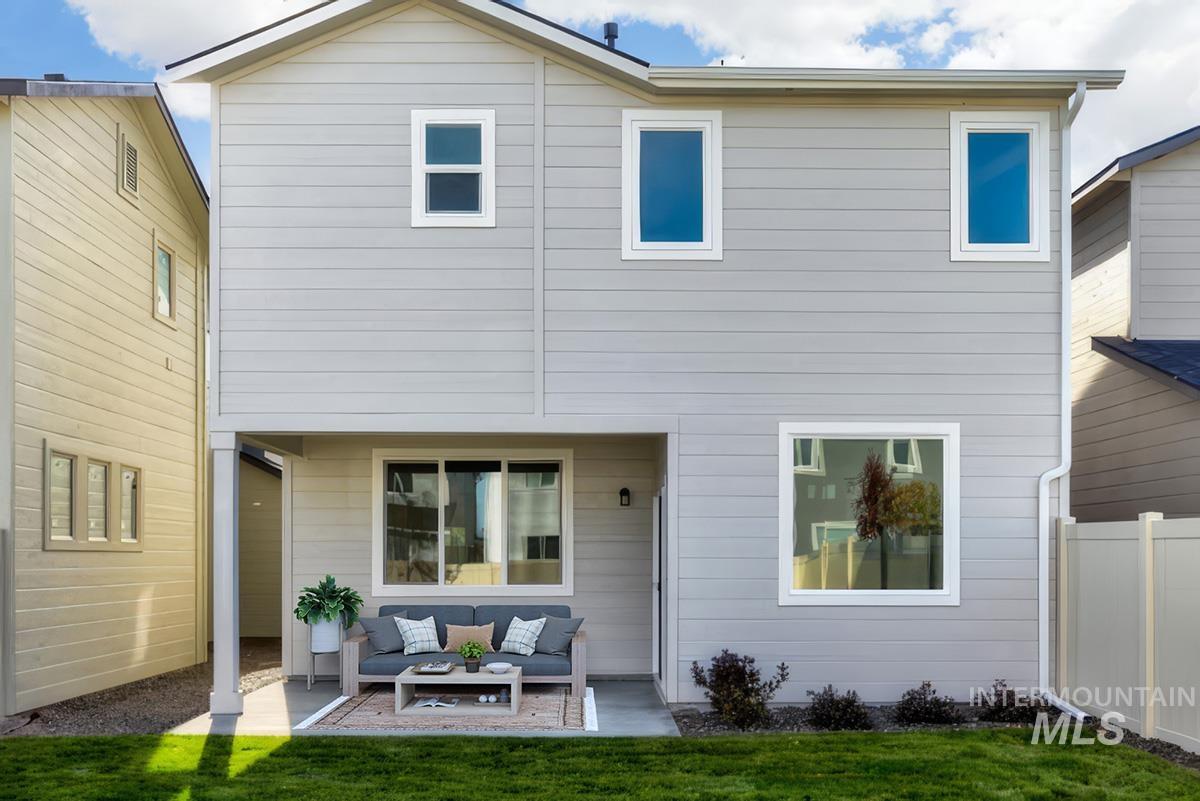 224 West Broyhill Street Meridian, ID 83642 - Photo 15 of 24 Back of property with an outdoor living space and a patio area