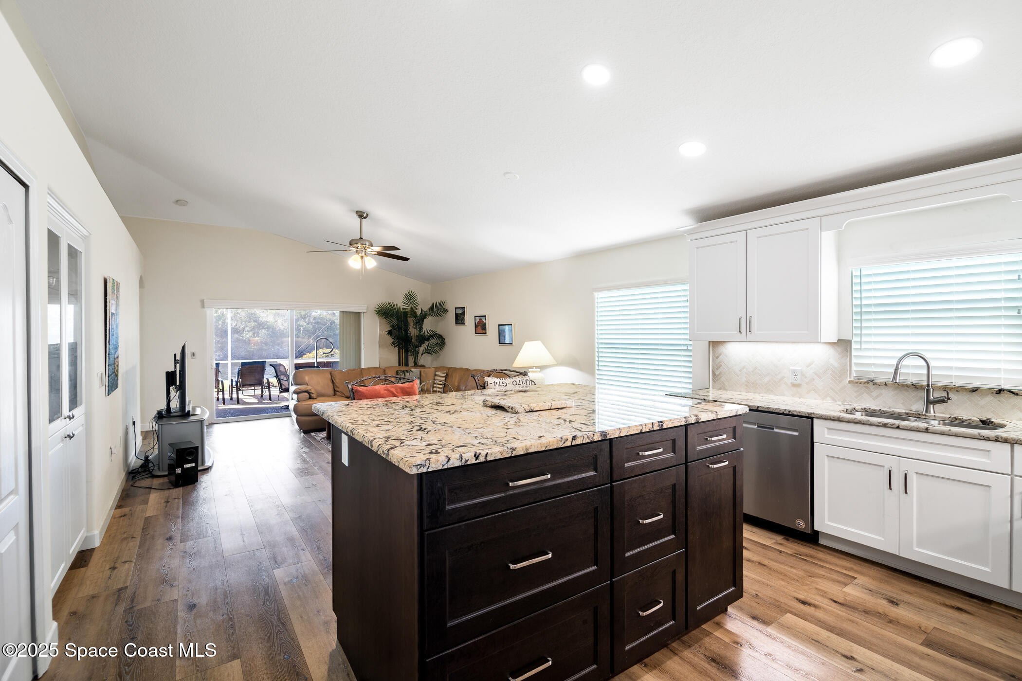 1444 Boca Rio Drive Melbourne, FL 32940 - Photo 11 of 59 Kitchen Open to Family Room