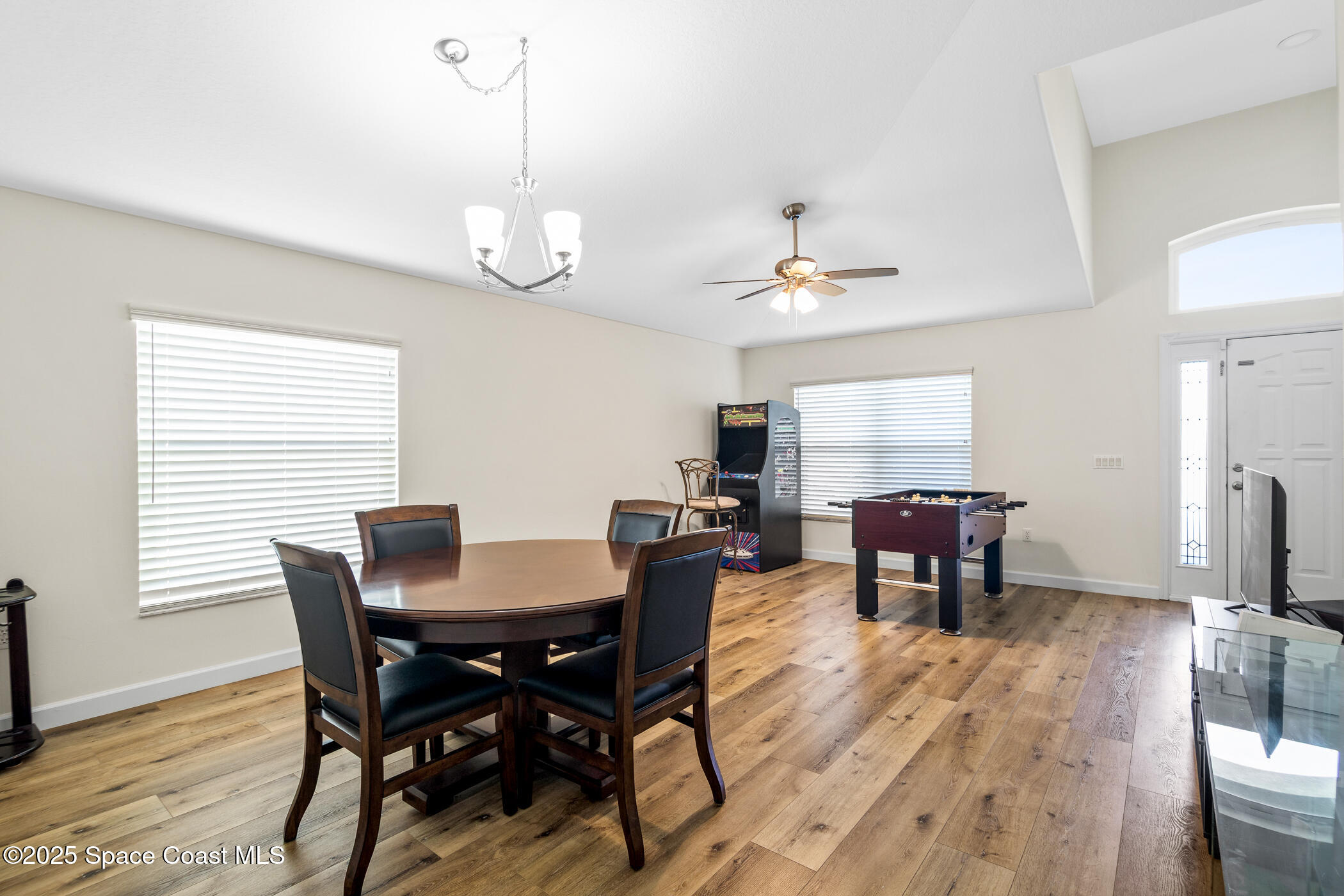 1444 Boca Rio Drive Melbourne, FL 32940 - Photo 7 of 59 Living and Dining Areas