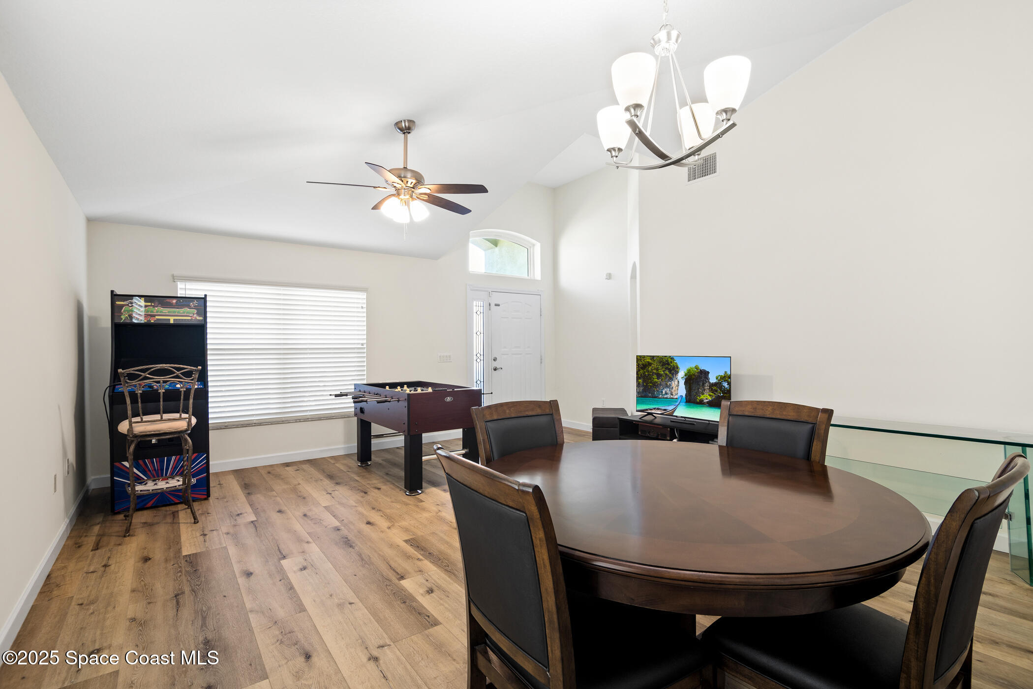1444 Boca Rio Drive Melbourne, FL 32940 - Photo 8 of 59 Living and Dining Areas