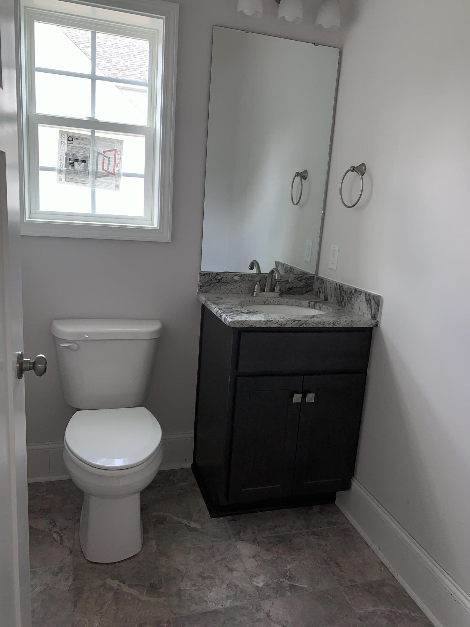 115 Medlin Road Pinehurst, NC 28374 - Photo 6 of 10 115 Medlin half bath
