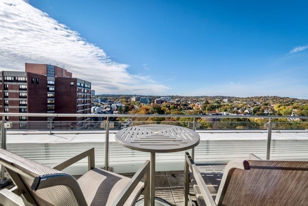 80 Fenwood Road, Unit 706 Boston, MA 02115 - Photo 19 of 33 a view of a balcony with chairs