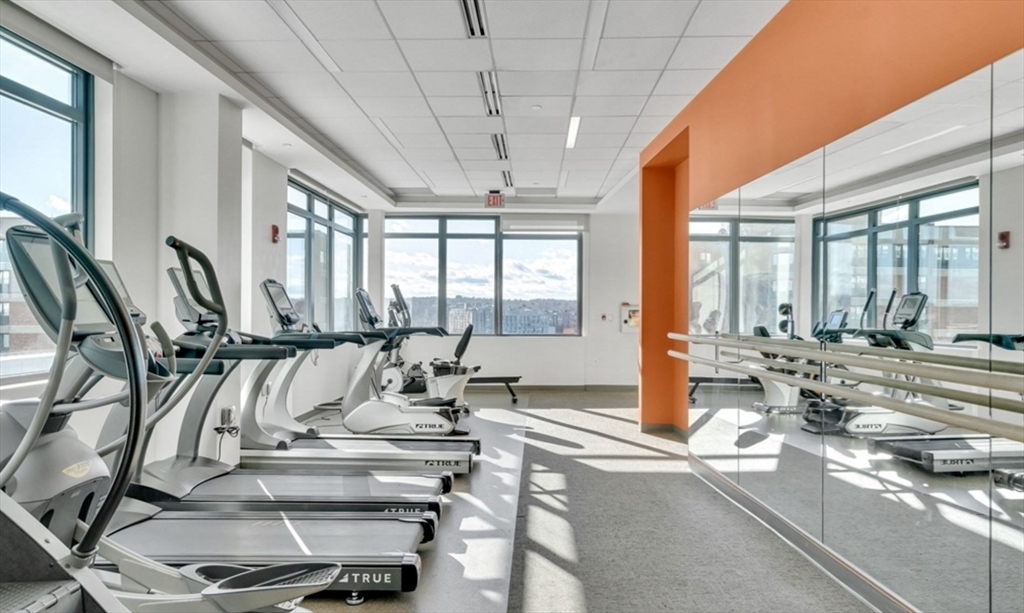 80 Fenwood Road, Unit 706 Boston, MA 02115 - Photo 24 of 33 a view of a living room and kitchen floor