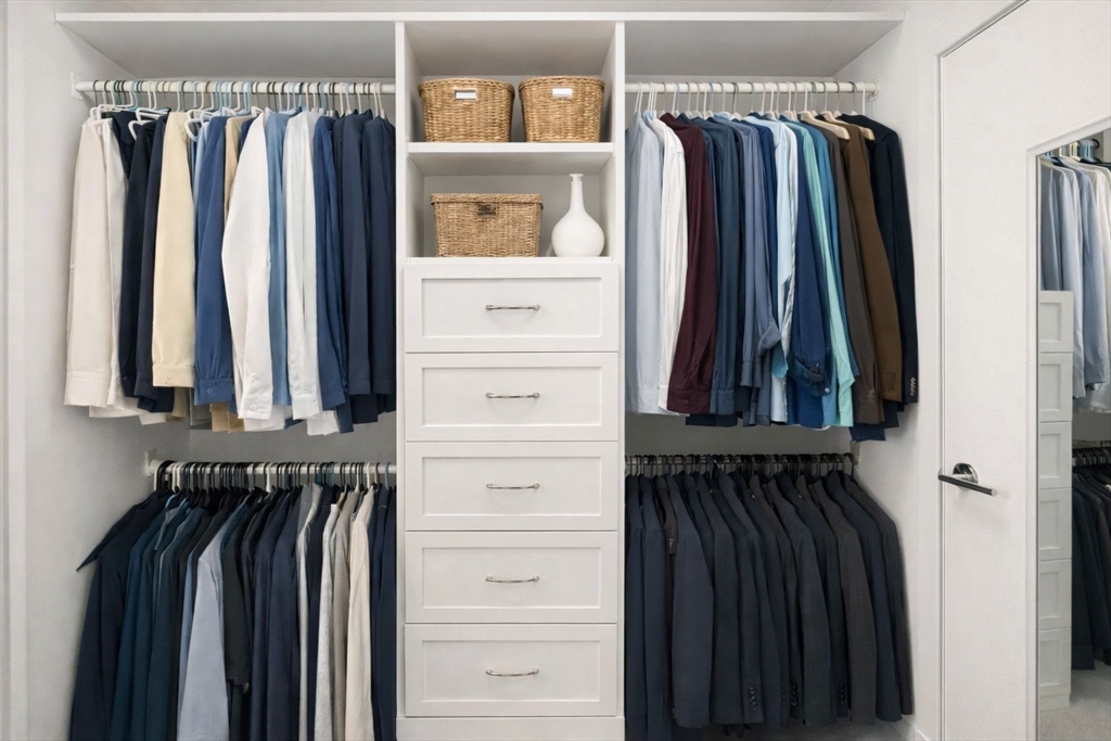 80 Fenwood Road, Unit 706 Boston, MA 02115 - Photo 9 of 33 a view of walk in closet with clothes and shoes