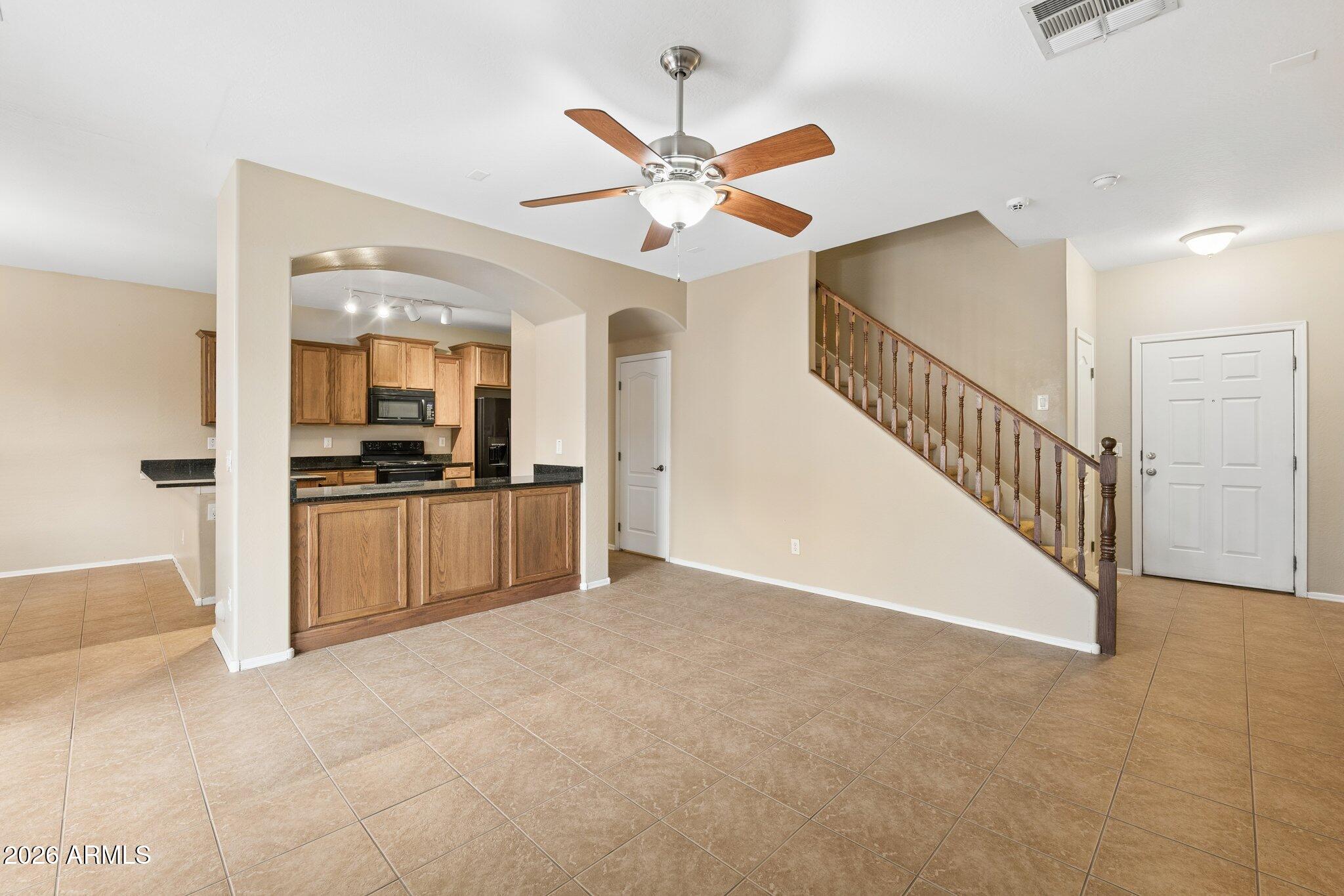 2226 East Fraktur Road Phoenix, AZ 85040 - Photo 6 of 68 Living room view to kitchen