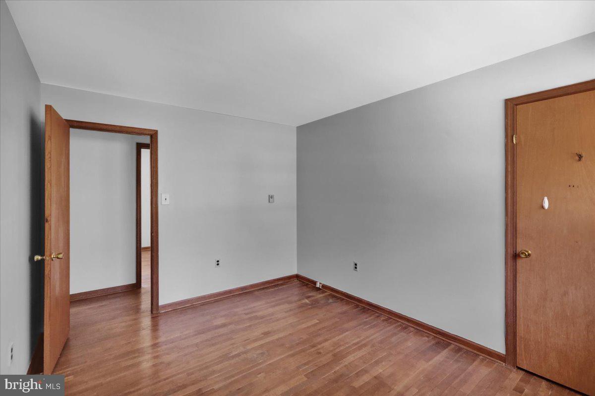 982 Fairview Road Glenmoore, PA 19343 - Photo 32 of 74 wooden floor in an empty room
