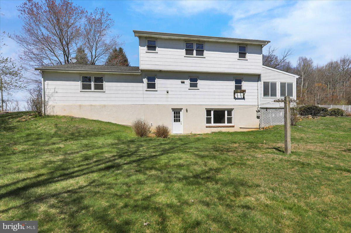 982 Fairview Road Glenmoore, PA 19343 - Photo 46 of 74 front view of a house with a yard