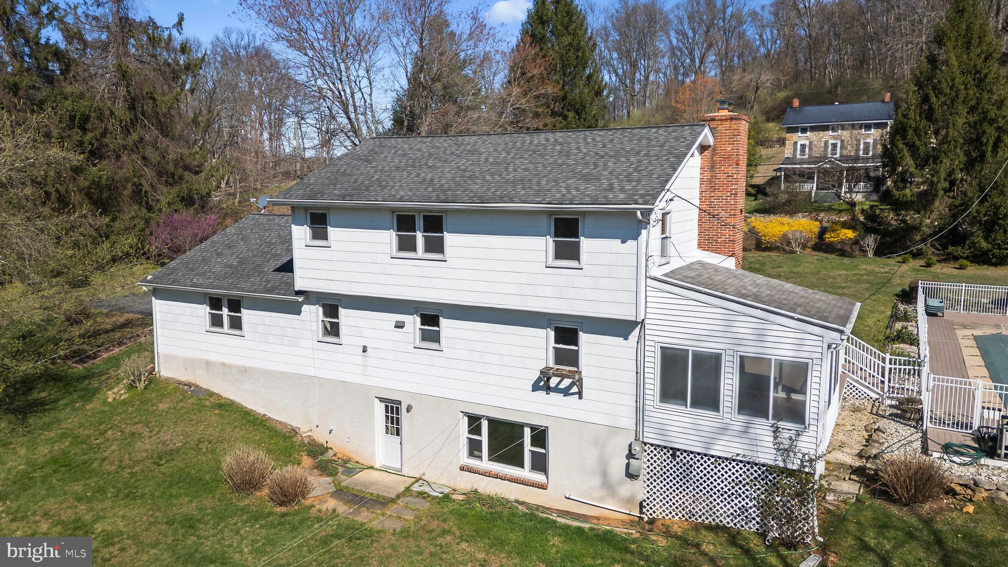 982 Fairview Road Glenmoore, PA 19343 - Photo 47 of 74 a aerial view of a house with a yard